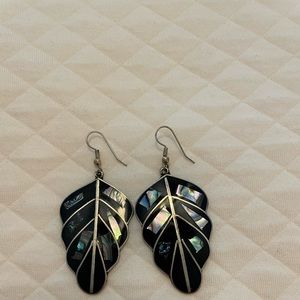 Pierced ear rings, made in Mexico.